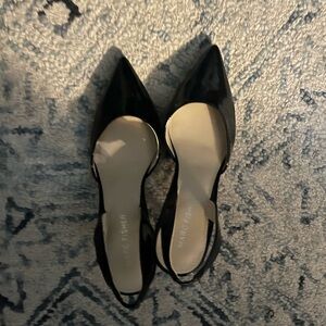 Black pointy heels. 2 inches